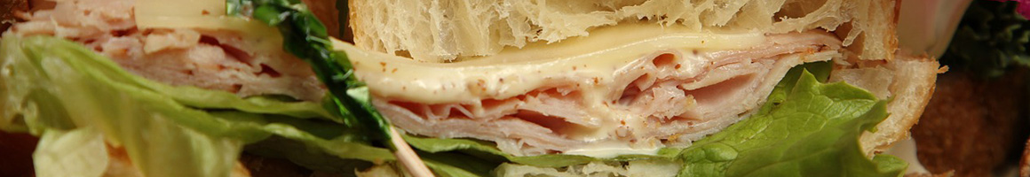 Eating Sandwich Bagels at Bagel Boy restaurant in Brooklyn, NY.